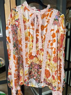 Stellah lace floral blouse top long sleeve bow tie front colorful button down